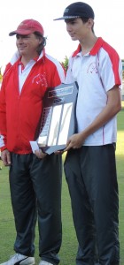 Lee and Christopher Wentworth holding the trophy for the third time.